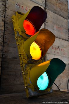 two traffic lights that are green and red