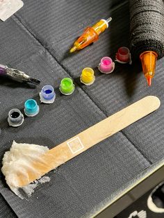 some crafting supplies are laying out on a table