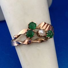 * Mid Century 14k Yellow Gold Green Glass Pearl Free Form Cocktail Ring * Ring Size: 5.75 * Top Of Ring Measures: 1/4" X 3/8" * Glass Rounds Measure: Approximately 2.6 Mm Each * Pearl Measures: Approximately 3.0 Mm * Ring Weight: 1.2 Tgw * Marked: Unmarked But Professionally Assayed * G747 Collectible Yellow Gold May Birthstone Ring, Yellow Gold May Birthstone Collectible Ring, Yellow Gold Jewelry Collectible For May Birthstone, Collectible Yellow Gold Jewelry For May Birthstone, Collectible May Birthstone Yellow Gold Ring, Vintage Yellow Gold May Birthstone Jewelry, Vintage Yellow Gold Jewelry For May Birthstone, Ring Ring, Cocktail Ring