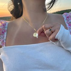 Hanna Bordage x Evry Jewels This dainty Sand Dollar Necklace will add a bit of fun to your jewelry collection! It features a sand dollar with some colorful stones, perfect for a summer look. The perfect piece to have you livin' the island life! *All our influencer collab pieces come with the influencer's name engraved on the back of each piece. Evry Jewels, Sand Dollar Necklace, Sand Dollar Pendant, Colorful Stones, Sand Dollar, Belly Rings, Summer Look, Island Life, Cz Stone