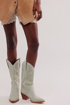 Stun in these so cool western-inspired boots from Jeffrey Campbell featuring classic embroidered details in a luxe leather design with a pointed toe and block heel. Pull-on styleCushioned insoleClassic rounded edgePull tabs on either side | Dagget Western Boots by Jeffrey Campbell at Free People in Blue, Size: US 7.5 Spring Stacked Heel Snip Toe Boots, Chic Ranch Boots For Spring, Chic Spring Boots For Ranch, Chic Spring Ranch Boots, Chic Heeled Boots For Rodeo In Spring, Spring Boots With Stacked Heel And Snip Toe, Stacked Heel Snip Toe Boots For Spring, Spring Ankle Heeled Boots For Ranch, Spring Ranch Ankle Heeled Boots