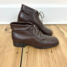 Item Description  What a cute pair of vintage brown leather lace-up ankle booties! I love the square-ish toe and the fold over lip!! They are in great vintage condition with very little wear and very minor tiny scuffs on the leather that are hardly noticeable. The bottom soles are very clean! They are marked women's 9.5M; please let us know if you need a foot bed length or a ball width measurement :) Item Specifics  Brand - St. John's Bay Material - Leather upper Color - Brown Policies and More Vintage Brown Chukka Boots For Fall, Retro Leather Combat Boots For Fall, Vintage Lace-up Chukka Boots For Fall, Brown High-top Chukka Boots For Fall, Retro Leather Lace-up Boots, Vintage Lace-up Boots With Round Toe For Fall, Brown Almond Toe Chukka Boots For Fall, Vintage Brown Chukka Ankle Boots, Vintage Chukka Boots With Round Toe For Fall