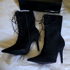 Black Lace Up Heeled Bootie, Never Worn 4.5 In Heel, Side Zipper Black Suede Party Lace-up Boots, Party Lace-up Black Synthetic Boots, Black Synthetic Lace-up Party Boots, Party Black Synthetic Lace-up Boots, Black Suede Lace-up Party Boots, Black High-top Heels For Night Out, Fitted Black Suede Lace-up Boots, Black Suede High Ankle Heels, Black Lace-up Boots With 4-inch Heel