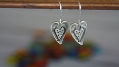 Artisan Silver Heart Earrings.  Lightweight and fun to wear.  Silver plated ear wire. Nickel-free Unique Heart Earrings, Unique Nickel-free Heart-shaped Earrings, Heart-shaped Pierced Earrings For Festivals, Bohemian Heart Jewelry For Everyday, Dangle Heart Earrings As Gift, Nickel-free Heart Earrings For Festivals, Unique Heart-shaped Earrings, Nickel Free Heart Earrings For Festivals, Handmade Bohemian Sterling Silver Heart Earrings