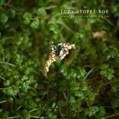 PLEASE NOTE: SOLID GOLD HAS A 3-4 WEEK LEAD TIME.This magical ocean inspired ring is set with a 1.1ct natural teal green Montana sapphire in a beautiful champagne yellow 9 carat gold band.  This piece was created from Lucy's original hand-sculpted design.    Size: This ring is U.K. size L 1/2. Different sizes can be made to order. Any re-sized rings will take longer to dispatch - please contact me for a lead time estimate.  Every sapphire is unique so the precise carat may vary very slightly.  O Nature-inspired Gold Emerald Ring As A Gift, Nature-inspired Gold Emerald Ring Gift, Gold Emerald Ring With Nature-inspired Style, Gold Nature-inspired Emerald Ring As A Gift, Gold Emerald Ring With Nature-inspired Design, Gold Nature-inspired Round Emerald Ring, Nature-inspired Gold Emerald Ring As Gift, Nature-inspired Gold Emerald Ring For Gift, Nature-inspired Gold Emerald Ring