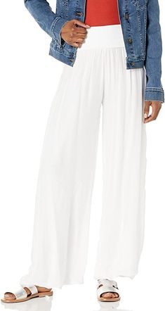 Our beautiful Adina palazzo pant has an amazing knit fabric underneath a silk overlay.  A flowy and relaxed fit gives this fabulous pant both style and comfort at the same time.  Wear to the beach or to lunch, out to dinner, or a garden party or wear just lounge around the house, you can't go wrong with this stunning pant.  Pair with our M Made In Italy silk tops for a complete fashionable look! Breezy Maxi Length Summer Bottoms, Breezy Maxi Length Bottoms For Summer, Breezy Maxi Summer Bottoms, White Non-stretch Wide Leg Harem Pants, Flowy Elegant Rayon Bottoms, White Harem Pants With Elastic Waistband For Spring, Flowy Spring Vacation Bottoms, White Rayon Bottoms For Summer, White Rayon Bottoms For Vacation