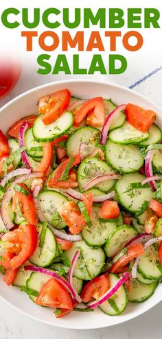 cucumber and tomato salad in a white bowl