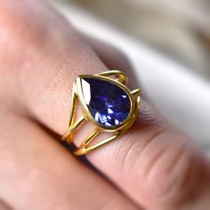 D E T A I L S - Stone: Tanzanite Quartz Material: 925 Sterling silver Stone Shape: Pear Stone Size: 10x14mm The Fit: True to US ring size Finish: Textured and Gold Plated to a high shine S H I P P I N G & P R O D U C T I O N - My current production time is 2-6 business days, which means after those days are up, your order ships! I make everything custom to order, by hand, but I promise you it's worth the wait! R U S H - M Y - O R D E R - If you're in a rush to get your pretty new pieces, ple Open Band Gemstone Jewelry Gift, Fine Jewelry Teardrop Crystal Ring As Gift, Gold Tanzanite Birthstone Ring As Gift, Teardrop Crystal Ring Fine Jewelry Gift, Gold Tanzanite Birthstone Ring For Gift, Fine Jewelry Tanzanite Ring For Gift, Pear-shaped Solitaire Jewelry As A Gift, Pear-shaped Solitaire Jewelry Gift, Pear-shaped Solitaire Jewelry For Gifts