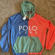 Polo Ralph Lauren 1992 Panelled Hooded Windbreaker - Multicolor Size M Casual Color Block Windbreaker For Winter, Casual Winter Windbreaker With Color Block, Casual Color Block Winter Windbreaker, Multicolor Hooded Windbreaker With Drawstring, Multicolor Hooded Windbreaker With Drawstring Hood, Casual Blue Windbreaker With Detachable Hood, Blue Color Block Hooded Windbreaker, Blue Hooded Windbreaker With Color Block, Blue Hooded Color Block Windbreaker