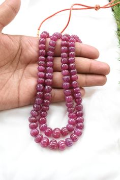 Stone : Precious Ruby Grade : AA Vintage Size : 5 mm to 12 mm Beads Shape : Carved Roundel Finishing : Carve Color : Red Length : 20 Inches Necklace Length Strands : 2 Weight : 873 Carats Birthstone : July Gemstone are made in Billions of Years in the Womb of Earth. Gemstones connect us widely to the universe and spirits. All the photographs of the item are captured in natural daylight. The photographs are uploaded without any enhancements or editing. All photographs depicts the color of Gemston Gemstone Beads Necklace, July Gemstone, Ruby Necklace Designs, Ruby Jewelry Necklaces, Pumpkin Beads, Banaras Sarees, Necklace Ruby, Pumpkin Bead, 20 Inch Necklace