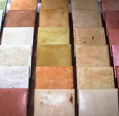 several different colors of tile sitting on top of each other