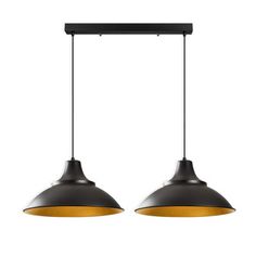 two black and yellow pendant lights hanging from the ceiling with one light on top of the other