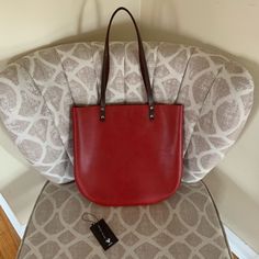 Gorgeous Simple, Slim Tote By Kiko. Measurements W 13.5 H 12.75 Handle Drop 10.5. Cherry Red With Rounded Bottom Curves. This Bag Is Nwt And Is In Near Perfect Condition. Tiny Ink Mark On Back Of Bag And Natural Leather Marking As Well. Please Look Closely At Pics. Casual Burgundy Shoulder Bag For Everyday Use, Casual Burgundy Shoulder Bag For Everyday, Casual Everyday Burgundy Shoulder Bag, Modern Red Shoulder Bag With Leather Handles, Modern Red Shoulder Bag With Leather Lining, Red Shopping Bags With Leather Lining, Trendy Red Shoulder Bag With Leather Handles, Everyday Red Soft Leather Shoulder Bag, Red Leather-lined Bags For Shopping