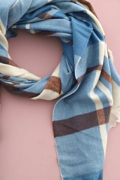 Wrap yourself in warmth and style with our Addison Scarf. Made from soft, knitted fabric, this check scarf is finished with a frayed edge for a touch of elegance. Available in a range of beautiful colours, it's the perfect accessory for any outfit. Stay cosy and chic this season! - Check pattern - Contrasting colours - Frayed edge Check Scarf, Contrasting Colours, Checked Scarf, Beautiful Colours, Check Pattern, Vest Dress, Tunic Dress, Contrasting Colors, Beautiful Colors