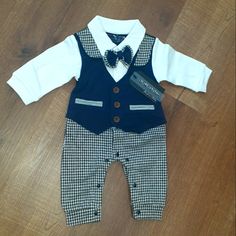 Infant Formal Wear Comfy Enough For Them Not To Fuss! These Are A Size 0-3 Months Which Makes Them Perfect For Someone's Newborn. Adorable And Soft Onesie With Attached Black And White Checkered Pants With Snaps Down The Legs, The Attached Navy Vest Has Brown Buttons And A Little 2 Tone Little Bow Tie Makes This A Super Adorable Option For A Baby Shower Gift Or For Your Own Little One To Wear To A Wedding Or Holiday Party. Lots Of Other Gifts And Clothes In My Closet Bundle For Big Savings! Reas Baby Polo, Halloween Bodysuit, Girls Gymnastics Leotards, Navy Vest, Tommy Hilfiger Baby, Checkered Pants, Newborn Onesies, Toddler Romper, Kids Couture