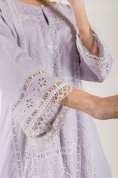 PRODUCT DETAIL: This embroidered lavender set comes laden with beautiful lace and cutwork. The subtle hues and breezy comfort fit, makes it a perfect outfit to adorn this summer. SPECIFICATIONS: Color LILAC Fabric Cotton Product Code RANG04 Modern Suit Designs For Women, Bohemian Sets With Intricate Embroidery For Summer, Lavender Cotton Sets For Spring, Spring Embroidered Lace Set, Purple Chikankari Embroidery Sets For Summer, Summer Purple Sets With Chikankari Embroidery, Spring Elegant Sets With Chikankari Embroidery, Elegant Spring Sets With Chikankari Embroidery, Traditional Lavender Dress With Chikankari Embroidery