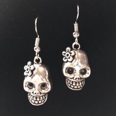 Feliz Dia De Los Muertos Sugar Skull Drop Earrings! Day Of The Dead Silver Dangle Earrings. Super Cute Skull Earrings Add Interest To Any Look. Charm Is Just Over 1/2” In Length. Metal Is Zinc Alloy. Bundle Items For Deeper Discounts Tags- October, Witch, Wiccan, Goth, Punk, Gypsy, Boho, Hippie, Festival, Summer, Vacation, Bohemian, Halloween, Costume, Skeleton, Spells, Witchy, Witchcraft, Mexican, Night Out, Fall, Autumn, Skull, Magic, Spell, Witchcraft, Gothic, Rock, Country, Ranch, Western, F Bohemian Halloween, October Witch, Halloween Costume Skeleton, Spell Witchcraft, Costume Skeleton, Mexican Night, Country Ranch, Sugar Skull Earrings, Cute Skull