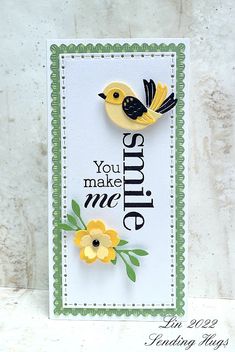 a handmade card with flowers and a bird on it that says you make me smile