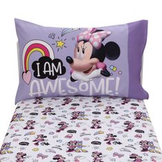 a bed with mickey mouse on it and i am awesome pillow case in the middle