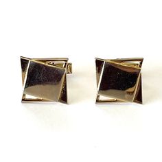 Vintage cufflinks  Gold tone metal  Please see pictures for size and details  Free Gift Wrapping available upon request  See More Treasures and Jewels at:  www.GlowingEmpire.com Modern Rectangular Cufflinks With Polished Finish, Modern Rectangular Polished Cufflinks, Modern Polished Cufflinks For Formal Occasions, Elegant Silver Cufflinks For Office, Modernist Rectangular Jewelry For Formal Occasions, Modern Rectangular Cufflinks For Business, Rectangular Polished Cufflinks For Formal Wear, Gold Clip-on Cufflinks For Business, Rectangular Polished Finish Cufflinks For Anniversary