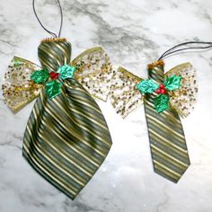 two green and gold christmas ties with bows