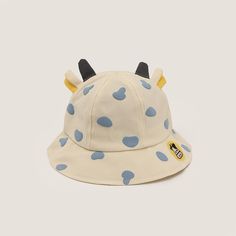 Add a touch of whimsy to your little one's outdoor adventures with our Cow Pattern Fisherman Hat! Crafted from durable material, this hat features a playful cow pattern that's sure to delight. With its wide brim, it provides excellent sun protection while keeping your child cool and comfortable. The adjustable chin strap ensures a secure fit, making it perfect for all-day wear. Material: Cotton. Color: Yellow, Beige, Orange, Pink. Cow Hat, Yellow Beige, Fisherman Hat, Cow Pattern, Wide Brimmed, Outdoor Adventures, Orange Pink, Outdoors Adventure, Sun Protection