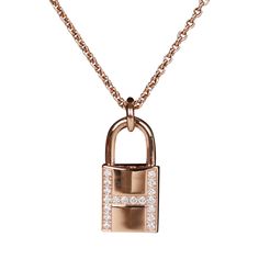 This Necklace is in 18k rose gold and set with 19 diamonds totaling .09 carats. Origin: France Condition: Pristine; new or never worn Accompanied by: Hermes box and dustbag Measurements: Length: 16 in, Pendant 0.72" x 0.5" Hermes Jewelry, Hermes Box, Gold Ounce, St Helena, Rose Gold Diamonds, Rose Gold Necklace, 18k Rose Gold, Luxury Bags, Gold Diamond