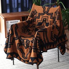 PRICES MAY VARY. Geometric Elegance: The black and dark orange geometric pattern on this soft blanket is both modern and timeless, adding a touch of tribal-inspired sophistication to any room. Soft and Durable: Crafted from polyester fleece, this couch blanket is incredibly soft and smooth to the touch. Its warm, cozy texture is perfect for snuggling, while its durable construction ensures long-lasting use. Versatile and Portable: Ideal for various settings, this tan throw blanket is easy to car Tan Throw Blanket, Cozy Texture, Couch Blanket, Fuzzy Blanket, Fluffy Blankets, Blanket For Couch, Vintage Blanket, Blanket Soft, Dark Orange