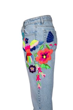 Here is a high rise regular, light blue woman jeans embroidered by hand just made for you. The colorful threats helped me to create cool bird and flower details on the jean trousers. The embroidery is on one side of the denim trousers. If you have doubt for the measurements please feel free to contact me any time. I just made this wearable art piece for you, good news, you can order your own size too. Measurements: Waist line: 13.77 Hips: 18.50 Length from the waist line: 38.50 Blue Straight Leg Bottoms With Floral Embroidery, Summer Floral Embroidery Straight Leg Jeans, Spring Festival Denim Jeans, Embroidered Denim Blue Jeans For Summer, Embroidered Straight Leg Denim Blue Jeans, Summer Embroidered Cotton Jeans, Embroidered Denim Blue Cotton Jeans, Embroidered Cotton Jeans In Denim Blue, Spring Embroidered Denim Jeans