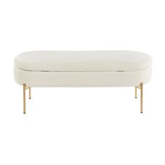 a white bench sitting on top of a metal frame base with gold legs and an upholstered cushion