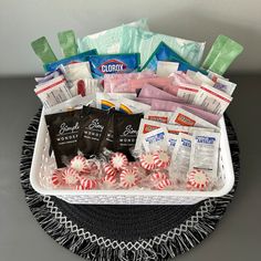 a basket filled with candy and candies on top of a table