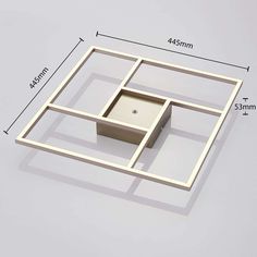 a square shaped object is shown with the base cut out to show it's size