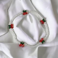 Delicately handcrafted, this beaded bracelet features adorable cherry charms. Wear it alone for a simple look or layer it with your other favourite bracelets! - Material: Acrylic beads and elastic urethane stretch cord - One size, 15-16cm  - Made in Korea Cherry Beaded Round Bead Jewelry, Cherry Beaded Bracelet, Cherry Bracelet, Bracelet Friendship, Beaded Jewellery, Bracelet Beaded, Bracelets Handmade Beaded, Glass Beaded Bracelets, Handmade Bracelet