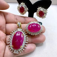 "This gorgeous, vivid, HUGE CABOCHON-Shaped, Burmese Ruby and stunning, impeccably graded F/VS Diamonds will totally melt everyone's heart! EXTREMELY RARE ENORMOUS 40.89 CARATS BURMESE RUBY with ATTRACTIVE, VIVID, HOT-PINKISH-RED color. SET IN FINE 18K SOLID YELLOW GOLD HANDCRAFTED PENDANT! ONLY ONE ITEM AVAILABLE!! WHAT YOU SEE IN THE PICTURES IS WHAT YOU WILL GET   \"You will get the best GEMSTONES from the most experienced GEMS wholesaler in the world.\" SUGGESTED RETAIL VALUE: $35,000 RUBY: Dazzling Gia-certified Ruby Jewelry, Dazzling Gia Certified Ruby Jewelry, Handmade Luxury Ruby Jewelry, Traditional Yellow Gold Jewelry For Valentine's Day, Exquisite Ruby Jewelry Gia Certified, Exquisite Gia Certified Jewelry Gift, Luxury Hallmarked Ruby Jewelry, Luxury Ruby Pendant Jewelry, Dazzling Red Hallmarked Jewelry