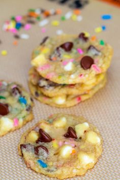 three cookies with chocolate chips and sprinkles