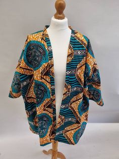 Beautiful kimono style short jacket made from African print material.  Can comfortably fit sizes 10-16. 100% cotton. Cool handwash to help keep shape. With pockets. To view my full range please visit bykalax.etsy.com. African Print Kimono, Kimono Style Jacket, Mode Kimono, Beautiful Kimonos, Jacket With Pockets, African Wax Print, Print Kimonos, Kimono Style, African Print Fashion