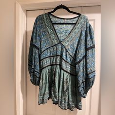 Never Worn, Forgot I Had This In My Closet. It’s Cute And Should Definitely Be Worn But I Need To Make Space In My Closet. It’s A Boho Tunic That Is Very Comfortable, Soft, Loose; It’s Blue And With Black. Bohemian V-neck Rayon Peasant Top, Flowy V-neck Rayon Peasant Top, Flowy V-neck Peasant Top, Bohemian V-neck Tunic With Floral Print, Bohemian V-neck Peasant Top With Boho Print, Bohemian Relaxed Fit V-neck Blouse, Bohemian Patterned V-neck Peasant Top, Bohemian V-neck Relaxed Fit Blouse, Bohemian V-neck Blouse With Relaxed Fit