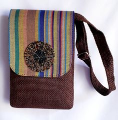 This Cross-body bag has a high quality, made from local materials with hand beaded decorations and African print fabric. This bag can be used for formal occasions and casual day out. Handmade ALL SALES ARE FINAL Beaded Decorations, Bridesmaid Clutch, Bridesmaid Clutches, Chain Purse, Large Clutch, Printed Purse, African Print Fabric, Hand Beading, Clutch Handbag