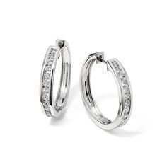 Add shine to any outfit  no matter the occasion  with these gorgeous hoop earrings. They feature natural diamonds in a sleek and secure 14-karat white gold channel setting. Elegant Diamond White Hoop Earrings Channel Set, Elegant Diamond White Channel Set Hoop Earrings, Channel Set Hoop Diamond Earrings In Sterling Silver, Sterling Silver Channel Set Hoop Diamond Earrings, Diamond White Channel Set Hoop Earrings, Step Kids, Channel Set, Natural Diamonds, Hoop Earrings