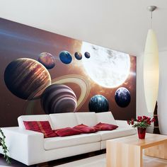 the living room is decorated with planets and stars