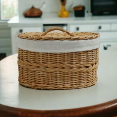 a wicker basket sitting on top of a table