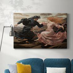 a painting on the wall above a couch in a room with blue furniture and pillows