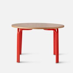 an orange table with two legs and a wooden top