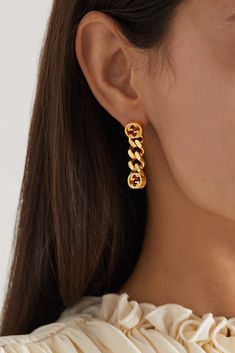 Gucci's earrings are tipped with the 'GG' logo at each side, anchored by chunky gourmette chains. Part of the 'Aria' collection, they've been cast in Italy from gold-tone metal and intricately etched. Gucci Earrings Gold, Italy Gold Jewelry, Gucci Jewelry Earring, Gucci Tarnish Resistant Gold Jewelry, Elegant Gucci Tarnish Resistant Jewelry, Gucci Luxury Link Jewelry, Classic Gucci Chain Jewelry, Gucci Metal Chain Jewelry, Luxury Gucci Yellow Gold Earrings