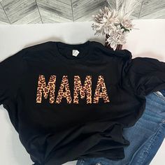 Introducing the "Mama Shirt" - the perfect t-shirt for all the amazing mamas out there! This heartwarming design features bold text and a cute graphic, making it perfect for showing off your love for your children. Whether you're wearing it to a family gathering, out running errands, or just lounging at home, the "Mama Shirt" is the perfect way to celebrate the special bond between a mother and child. With its bold and heartwarming design, this t-shirt is perfect for any mama who wants to show o Mini Gifts, New Mom Shirt, Mama And Mini, Unique Sweatshirt, Bold Text, Svg Downloads, Love And Pride, Mama Shirts, Mothers Day Gifts