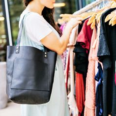 The Abbie pocketed tote is handcrafted from premium full-grain leather. This premium leather is water-resistant and is made to withstand daily use to last you a lifetime and more! The Abbie features a large pocket on the front and inside to hold all your essentials. And don't you hate losing your keys at the bottom of your purse? Well we thought of that, and the Abbie tote comes with a key hook so that doesn't happen. Also available in black. We promise you'll love it or your money back! Handmad Modern Everyday Bags With Side Pockets, Modern Bags With Side Pockets For Everyday, Modern Bags With Side Pockets, Leather Bags With Pockets For Everyday Use, Modern Bags With Side Pockets For Daily Use, Leather Bag With Silt Pocket For Everyday Use, Everyday Black Bags With Side Pockets, Black Bags With Side Pockets For Everyday Use, Black Everyday Bag With Side Pockets