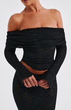 This slightly sheer, sexy top looks amazing paired with maxis, minis or your fave denim. Crafted in our premium stretch floral lace and fully lined in mesh, it features a gathered fold-over neckline and long sleeves with flared cuffs.


Colour: Black.

Premium stretch floral lace.

Fully lined.

Gathered neckline.

Fold over detail at neckline.

Off the shoulder styling.

Shaped hem.

Long sleeves with flared cuffs.

Cropped length.

Model is an XS and is wearing an XS.

 Size: XS, S, M, L, XL, Homecoming Dresses Corset, White Dress Spring, Midi Dress Wedding Guest, Long Sleeve Bridesmaid Dress, Long Sleeve Homecoming Dresses, Gathered Neckline, Homecoming Dresses Long, Maxi Dress Sale, Popular Dresses