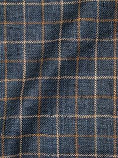 a blue and brown checkered suit fabric