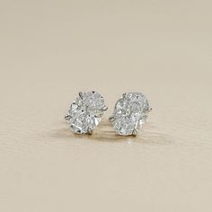 Sparkling Natural Oval Diamond Stud Earrings/ Natural Stones In A Secure Prong Setting/ A Beautiful, Unique Twist on Classic Diamond Studs/ Perfect For Everyday Elegance Or Gifting SKU: EDS0093 ✯✯ 𝐃𝐢𝐚𝐦𝐨𝐧𝐝 𝐃𝐞𝐭𝐚𝐢𝐥𝐬 ✯✯ ➺ Shape: Oval ➺ Color-Clarity: EF-VS/SI, GH-VS/SI ➺ Weight: 0.25 To 1.00 TCW ➺ Diamond Type: Natural Earth-Mined ✯✯ 𝐄𝐚𝐫𝐫𝐢𝐧𝐠𝐬 𝐃𝐞𝐭𝐚𝐢𝐥𝐬 ✯✯ ➺ Setting Type: Prong ➺ Back Type: Screw Back or Push Back ✯✯ 𝐆𝐨𝐥𝐝 / 𝐏𝐥𝐚𝐭𝐢𝐧𝐮𝐦 𝐃𝐞𝐭𝐚𝐢𝐥𝐬 ✯✯ ➺ It can be made in 10K/ 14K/ 18K Solid Gold & 950 Platinum. ➺ Gold metal tones can be made in Yellow, White & Rose. ✯✯ 𝐂𝐞𝐫𝐭𝐢𝐟𝐢𝐜𝐚𝐭𝐢𝐨𝐧𝐬 ✯✯ ➺ We offer IGI/GIA certifications as an optional service for an additional fee. If you would like to include certification with your purchase, please inform us Earrings Classic, Everyday Elegance, Jewelry Showcases, White Gold Earrings, Diamond Stud Earrings, Diamond Stud, Natural Earth, Dream Jewelry, Oval Diamond