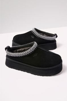 The UGG® Tazz platform slipper is crafted in a suede fabric with an EVA outsole and cozy UGGplush™ lining, a moisture-wicking textile made from a wool-rich blend but made to feel and wear like shearling. | UGG Women's Tazz Shoes, Size 6, Black Ugg Tazz Platform, Black Ugg Slippers, Autumn Fashion Work, Ugg Tazz, Black Uggs, Ugg Slippers, Sheepskin Boots, Hype Shoes, Platform Slippers